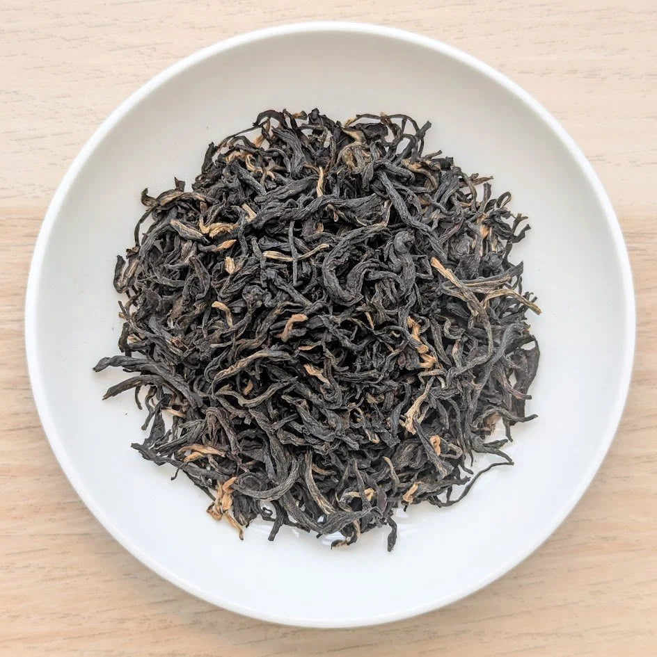 Tinjure Golden Black